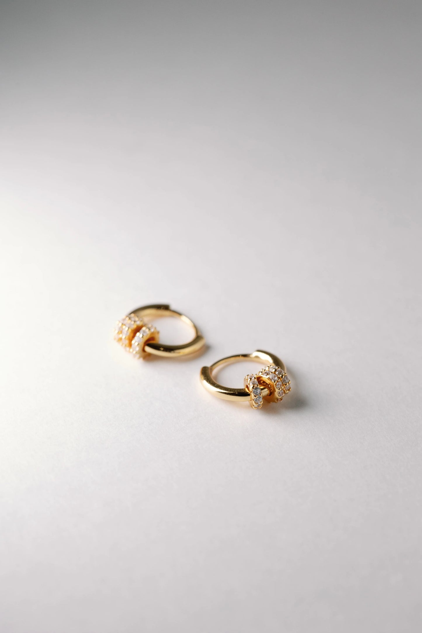 Knot Huggie Hoops - Mellow