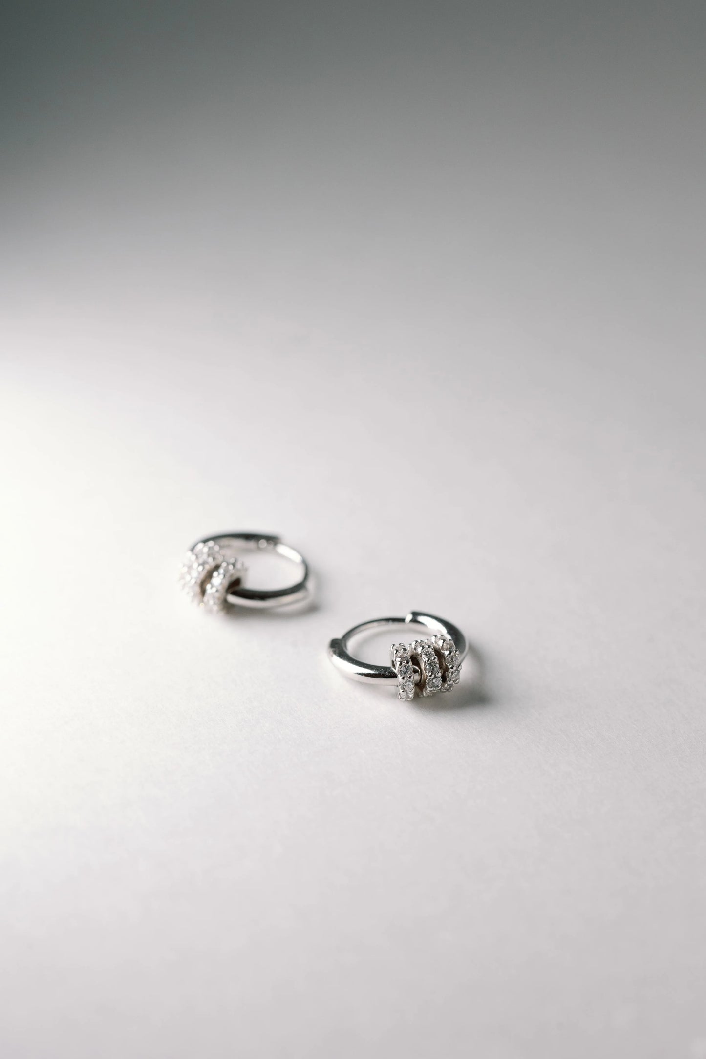 Knot Huggie Hoops - Mellow