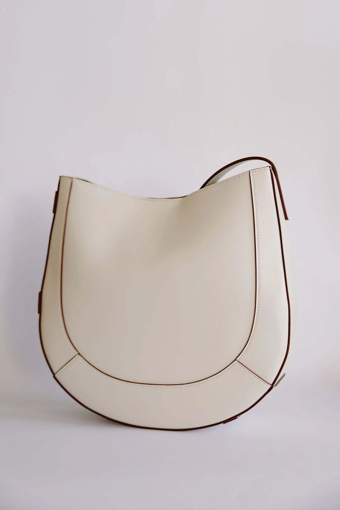 The Curved Saddle Bag - Mellow