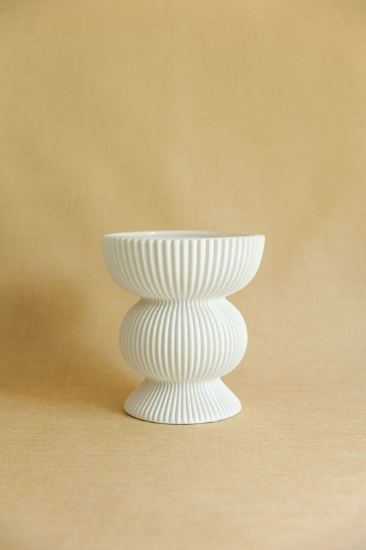 Fluted Column ceramic vase with vertical ribbed texture and architectural silhouette