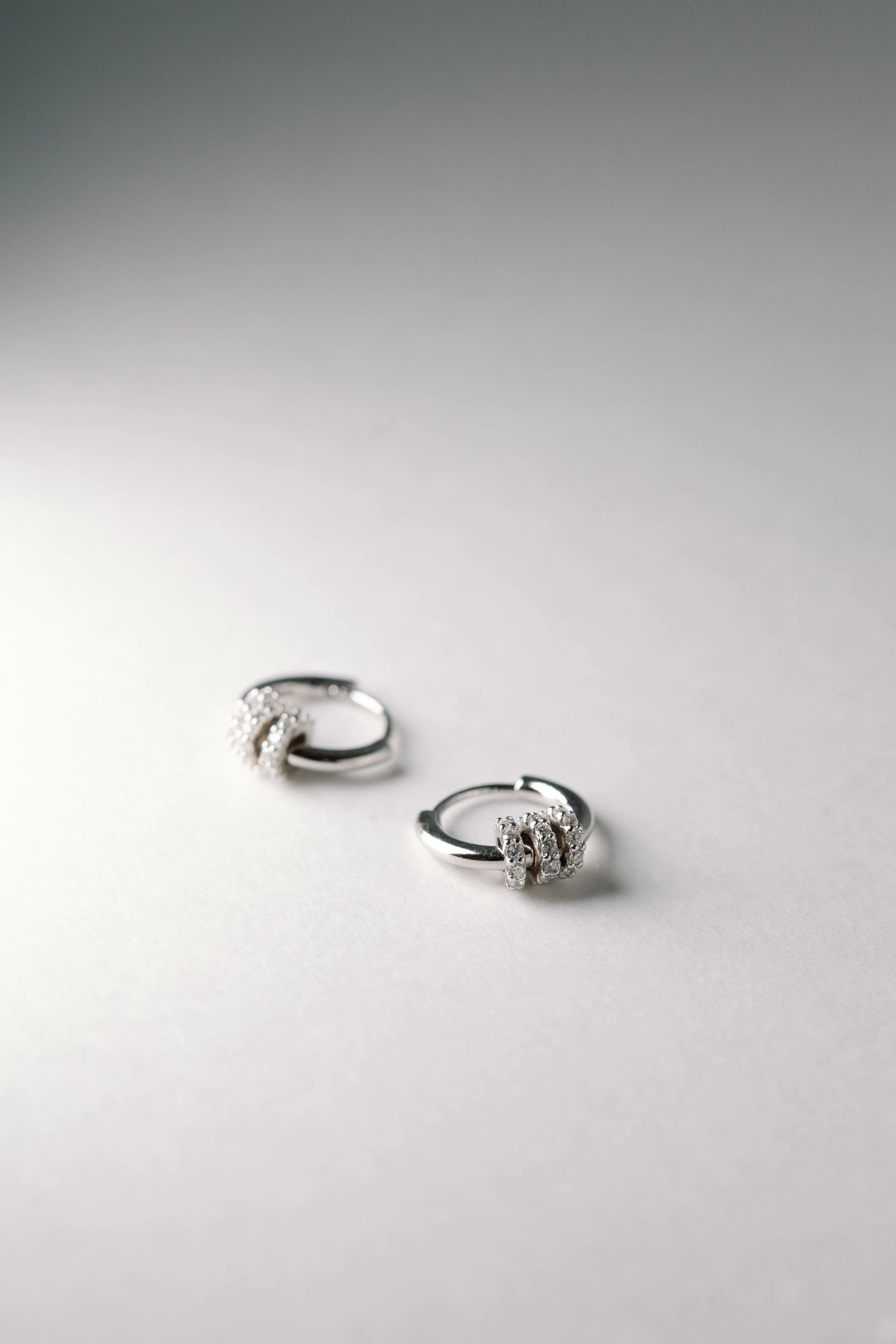 Knot Huggie Hoops - Mellow