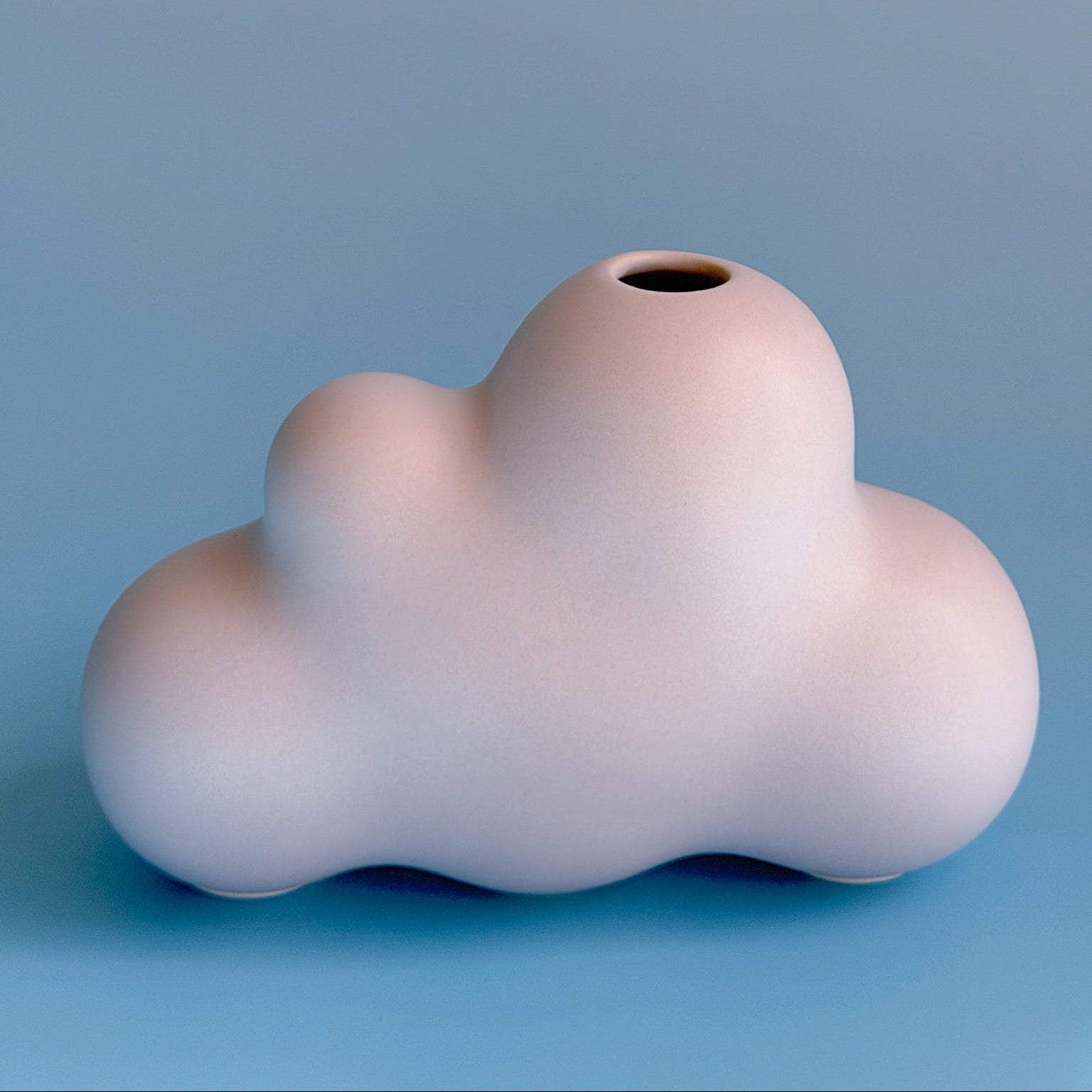 lavender cloud bud vases on a blue blackground