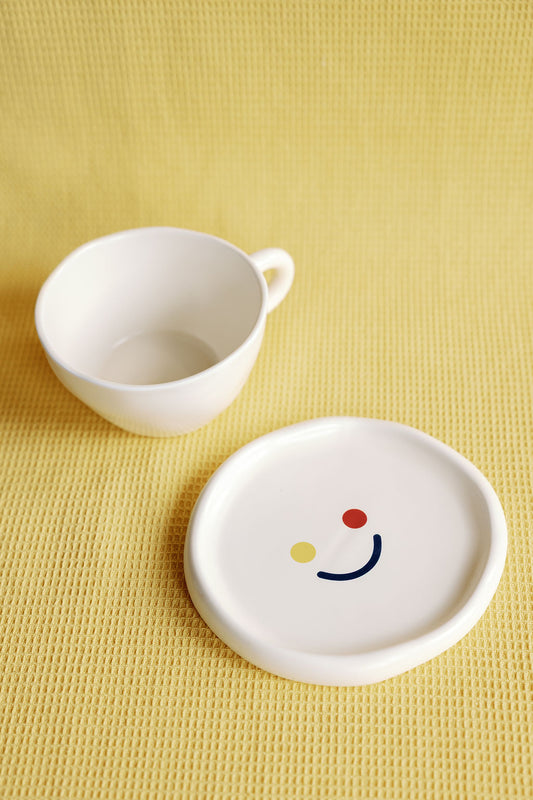 Bright Side porcelain cup and saucer with cheerful sunshine yellow floral pattern