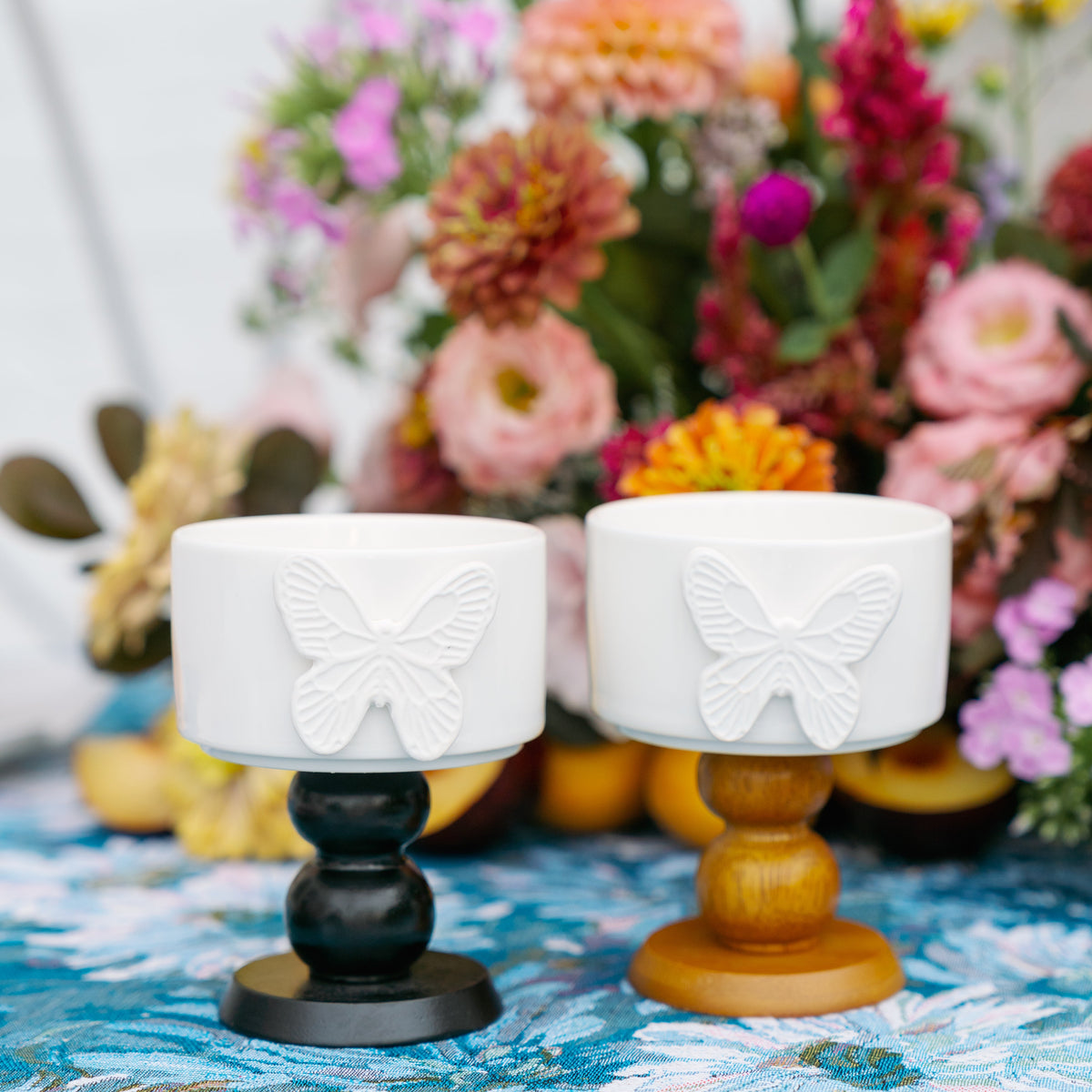 Butterfly pedestal porcelain cup with sculpted pedestal base and butterfly detail
