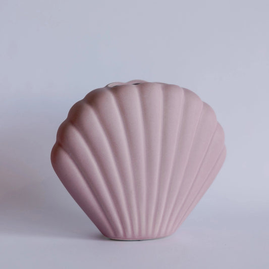 Ceramic seashell bud vase with sculpted seashell silhouette for single stems