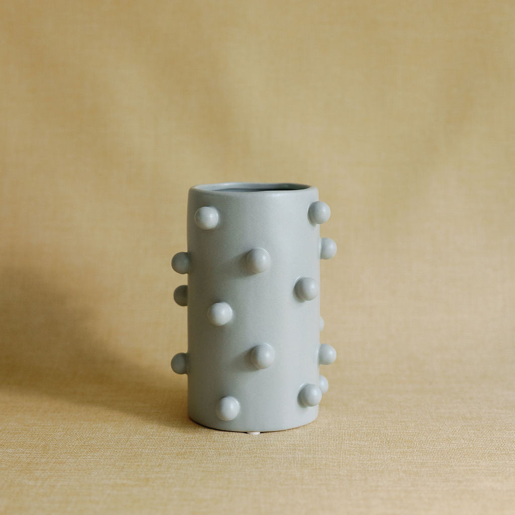 Dotty Cylinder ceramic vase with hand-painted dotted pattern and cylindrical silhouette