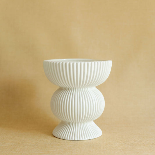 Fluted Column ceramic vase with vertical ribbed texture and architectural silhouette