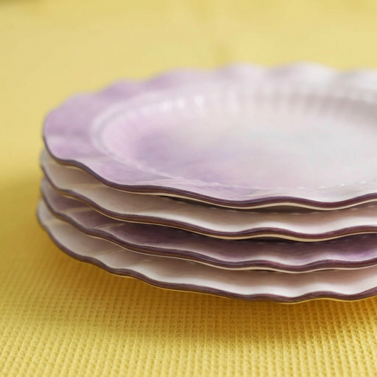 stack of 4 ombre purple porcelain plates with ruffle scalloped rim