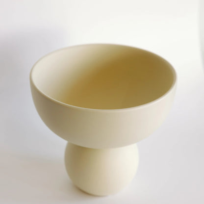 Sophie cream ceramic vase shot from above, showing the open bowl interior and spherical pedestal foot