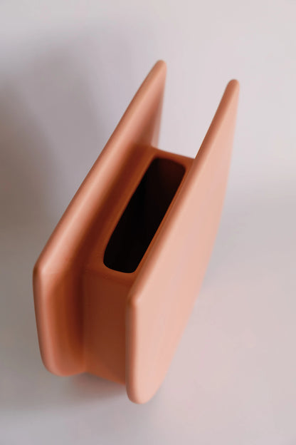Sunrise ceramic vase from above in peach tone, looking down into the narrow rectangular opening